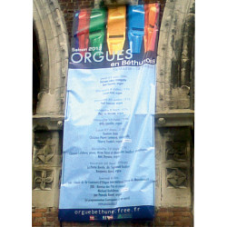 Réalisation bache publicitaire verticale sur batiment classé