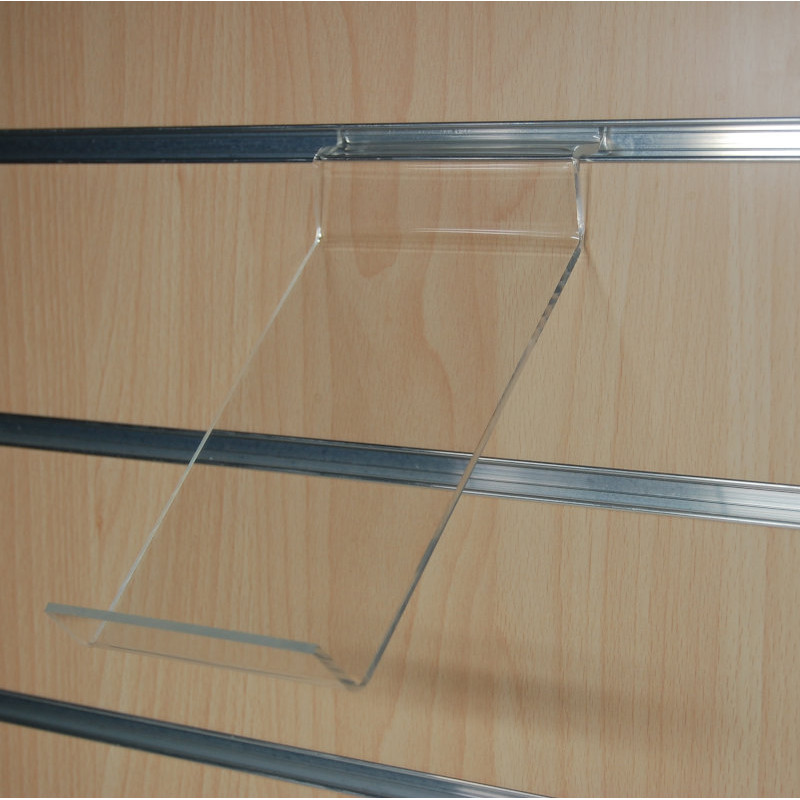 Présentoir produit de fond de lame rainuré